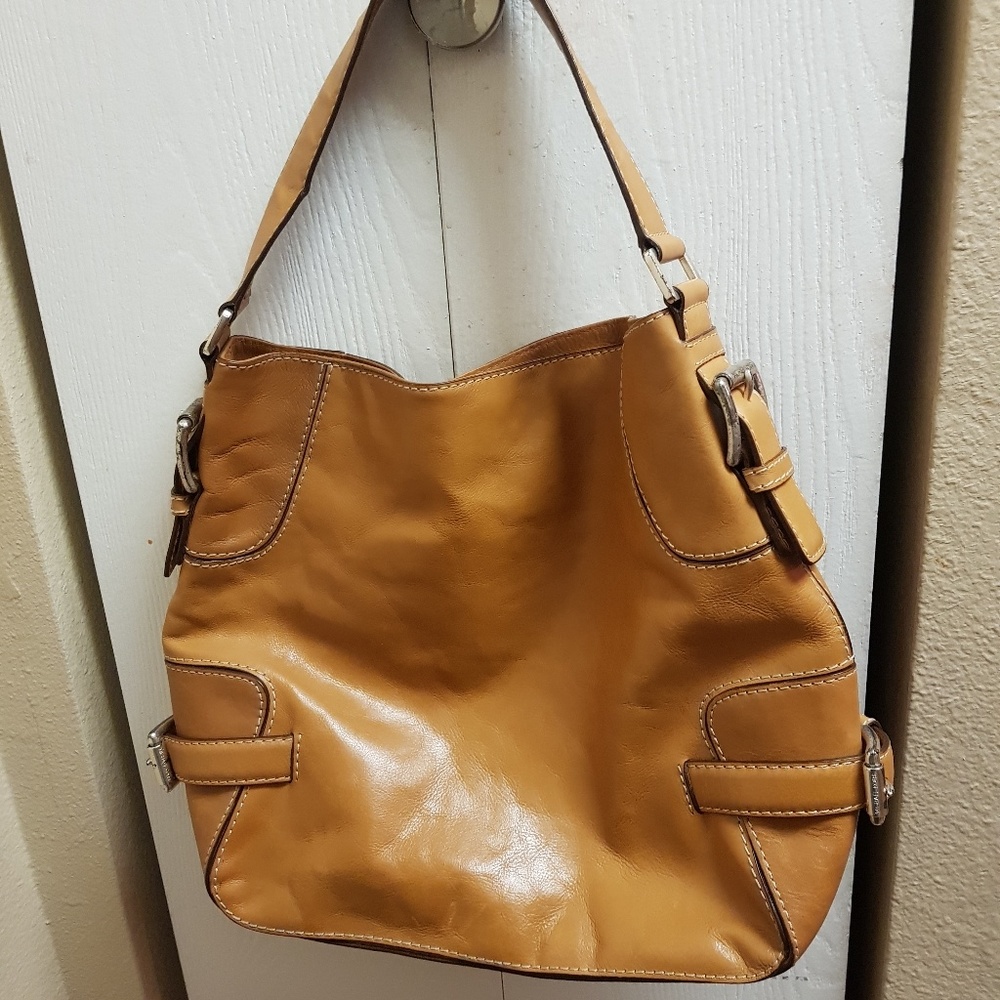 Michael Kors large brown leather totes bag.